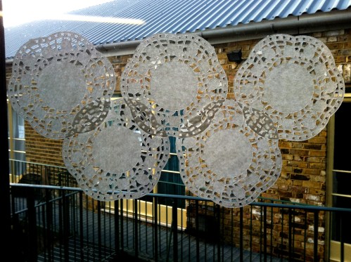 Olympic logo a day 02: doilies from a client picnic